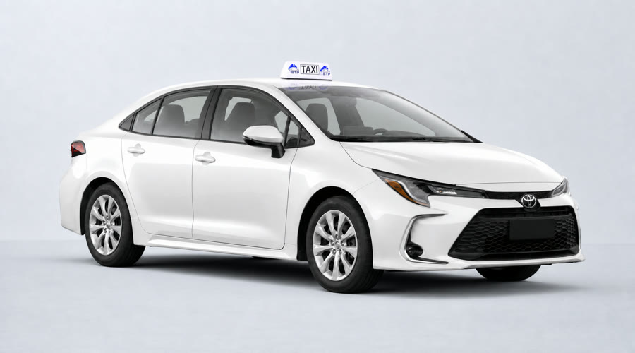Toyota Corolla sedan z lampą BTP TAXI